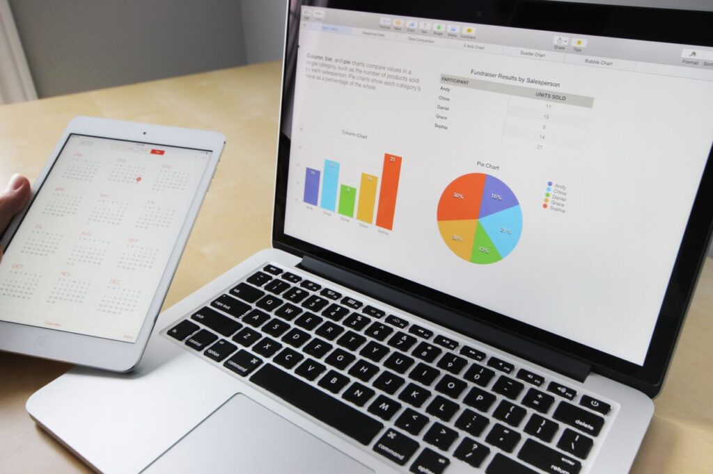 Small business owner reviewing centralized customer data on a CRM dashboard