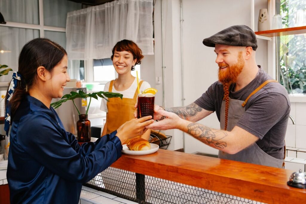 Returning customer greeted by familiar business owner